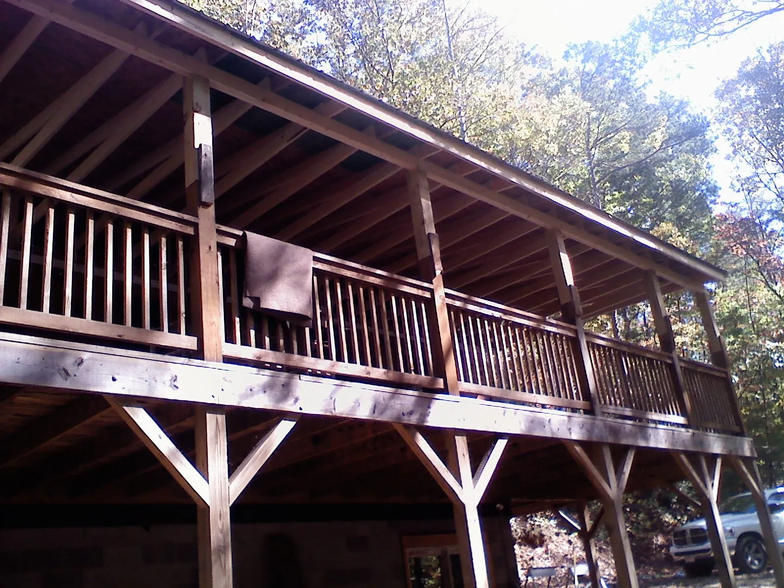 Timber framing under a new elevated porch and deck — Roof Leak Repair in Trussville by Roofing Brothers